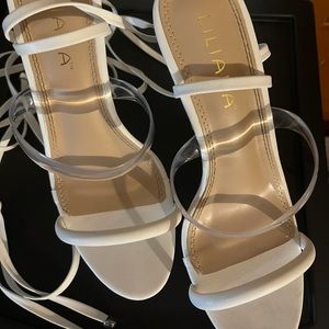 Akira Clear Platform Heel.